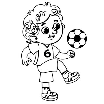 Black and white little boy in sports wear is playing with a soccer ball. 