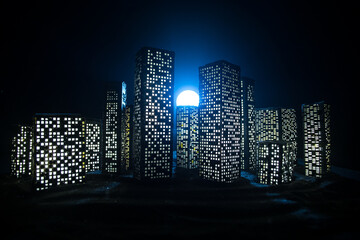 Cartoon style city buildings. Realistic city building miniatures with lights. background.