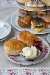 Afternoon tea with scones, cakes and sandwiches