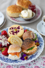 Afternoon tea with scones, cakes and sandwiches