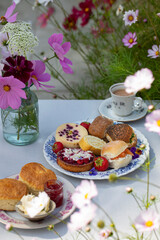 Afternoon tea with scones, cakes and sandwiches