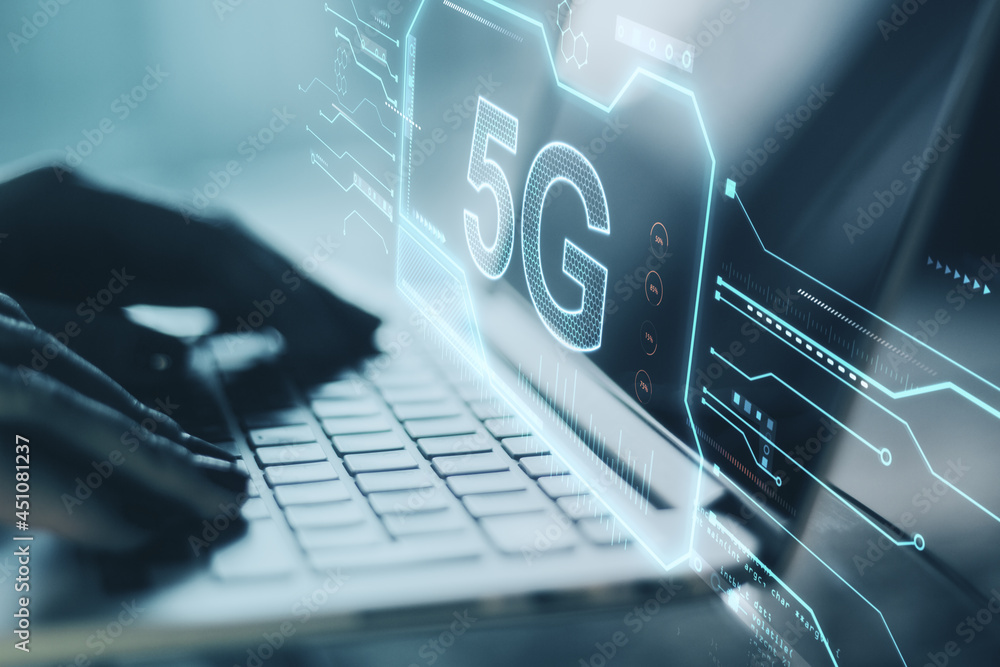 Poster hand using laptop with abstract 5g hologram. communication and speed concept. double exposure.