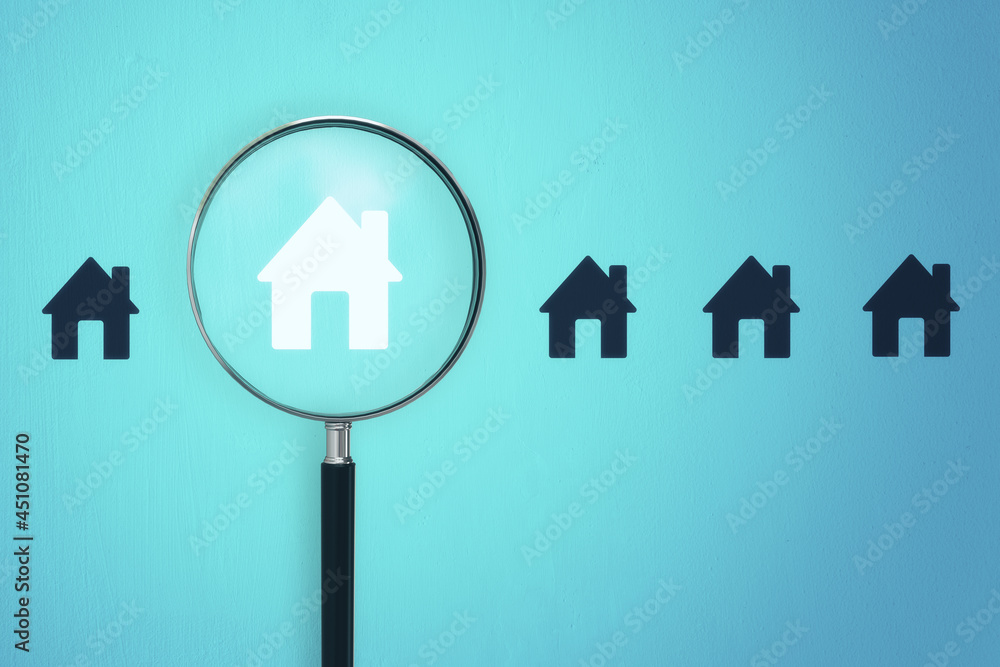 Poster Magnifier zooming in on house icon on blue background. Home and property search concept. 3D Rendering.