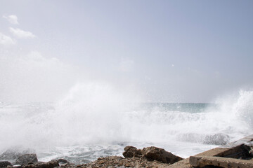 waves crashing on rocks