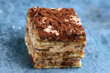 Small portion of a chocolate cake and sponge cake.