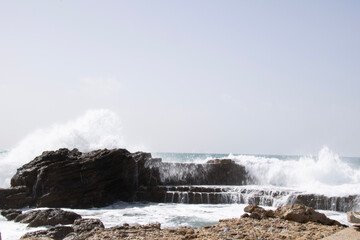 waves crashing on rocks