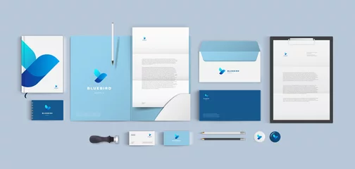 Fotobehang Top view stationery design mock up set for corporate identity or branding on table. Blue color style and grey background. Realistic bundle with folder, letter, envelope and business card. © Mark