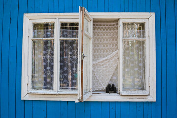 Binoculars in the house on the window, travel