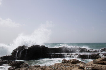waves crashing on rocks