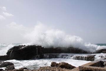 waves crashing on the rocks