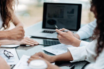 business team discussing marketing schemes. close up.