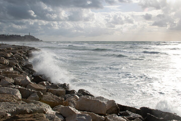 waves crashing on rocks