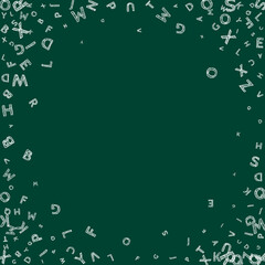 Falling letters of English language. Chalk handdrawn flying words of Latin alphabet. Foreign languages study concept. Favorable back to school banner on blackboard background.