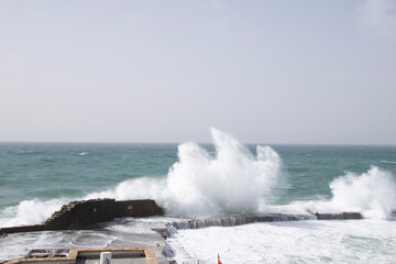 waves crashing on rocks