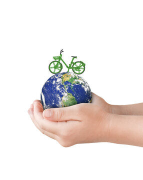 Hand holding globe earth with green bicycle isolated on white background. Environment day concept. Elements of this image furnished by NASA