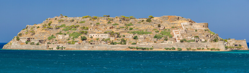 Fototapeta na wymiar Panoramic view of the ancient Venetian fortress and former leper colony of Spinalonga island, Crete, Greece