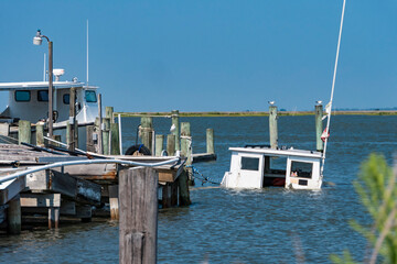 Deal Island, Maryland USA  A sunken fishing boat on the Chesapeake Bay