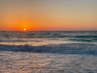 Naklejka premium sunset on the beach