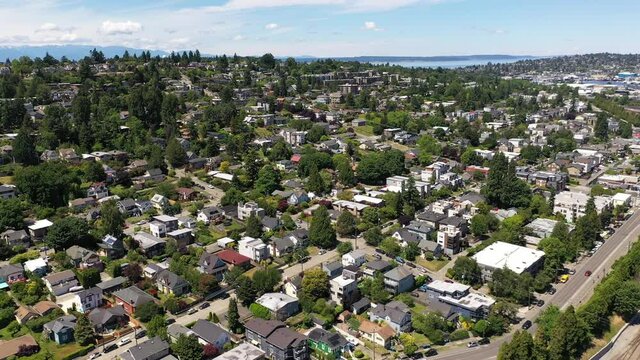 Cinematic 4K aerial drone footage of Lawton Park, Southeast Magnolia, Interbay, Fremont, Adams, coastal neighborhoods uptown by Puget Sound, in Seattle, Washington