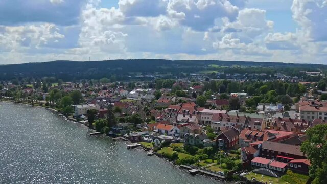Beachfront Houses At The Lake V&auml;ttern In The City Hjo, Sweden - aerial drone shot