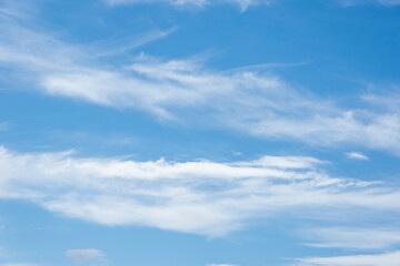 Real Soft Textured Feathery Clouds In Blue Sky Background. On a summer day, feathery fluffy clouds...