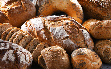 Assorted bakery products including loafs of bread and rolls