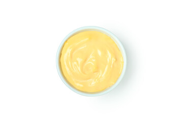 Bowl with cheese sauce isolated on white background
