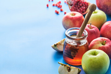 Jewish holiday Rosh Hashanah with honey and apples.