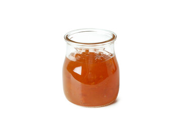 Jar of peach jam isolated on white background