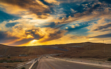 Colorful sunset sky over the road