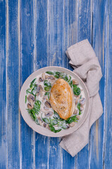 Fried bird breasts with stewed vegetables