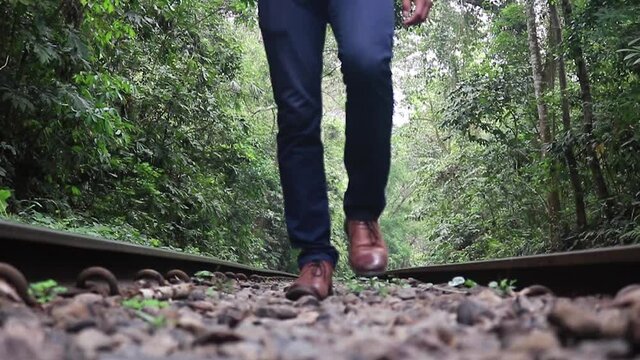 Person Walking On Railway Train Track Lawachara National Park, Sylhet Bangladesh