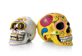 Painted human skulls for Mexico's Day of the Dead (El Dia de Muertos) on white background