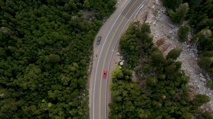 Aerial View Of Red Convertible 1958 Chevrolet Impala Driving Big Cottonwood Canyon Scenic Drive In Utah, USA.