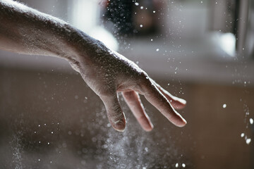 A wave of the hand and a scattering of flour