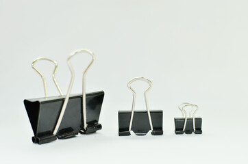 Paper clip over white background
