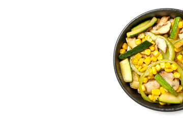 Frying pan with different vegetables on white background