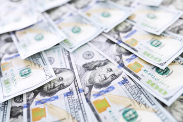 Group of money stack of 100 US dollars banknotes a lot of the background texture. Cash money in a large pile as a finance background.