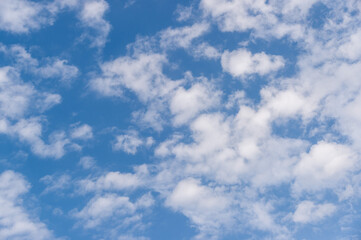 Beautiful blue sky and white clouds. The background of nature.