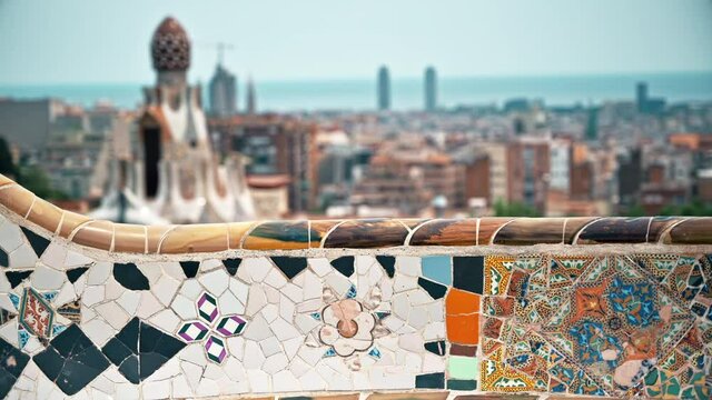 Fence in the Parc Guell with view of Barcelona on the background in Spain