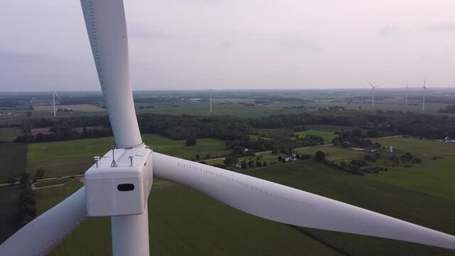 Aerial View Of Windmills In Green Summer Field - DTE Isabella Wind Farm, Isabella County, Michigan - drone shot