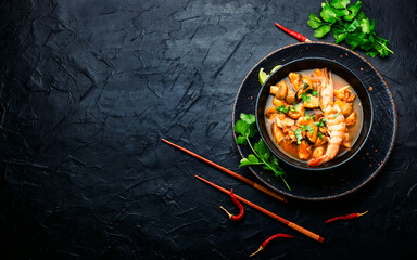 Tom yum soup with seafood and coconut milk