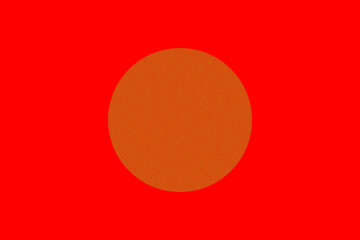 Golden circle in the center of the red background (Japanese flag like)
