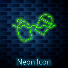 Glowing neon line The problem of pollution of the ocean icon isolated on brick wall background. The garbage, plastic, bags on the sea. Vector Illustration