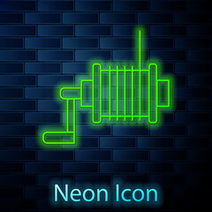 Glowing neon line Spinning reel for fishing icon isolated on brick wall background. Fishing coil. Fishing tackle. Vector