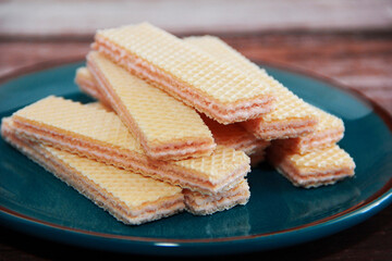 sweet fluted waffles on a decorative plate