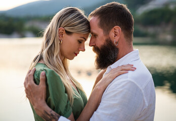 Fototapeta premium Happy mature couple in love hugging in nature.