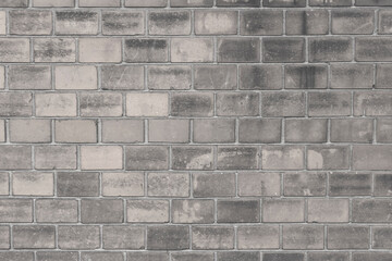 Fototapeta premium A brick wall in an old house. The texture of aged brickwork.