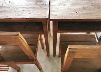 Old wooden desk and chair for students