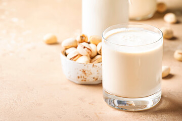 Cashew milk in bottles. Non dairy alternative vegan drink. Negative space